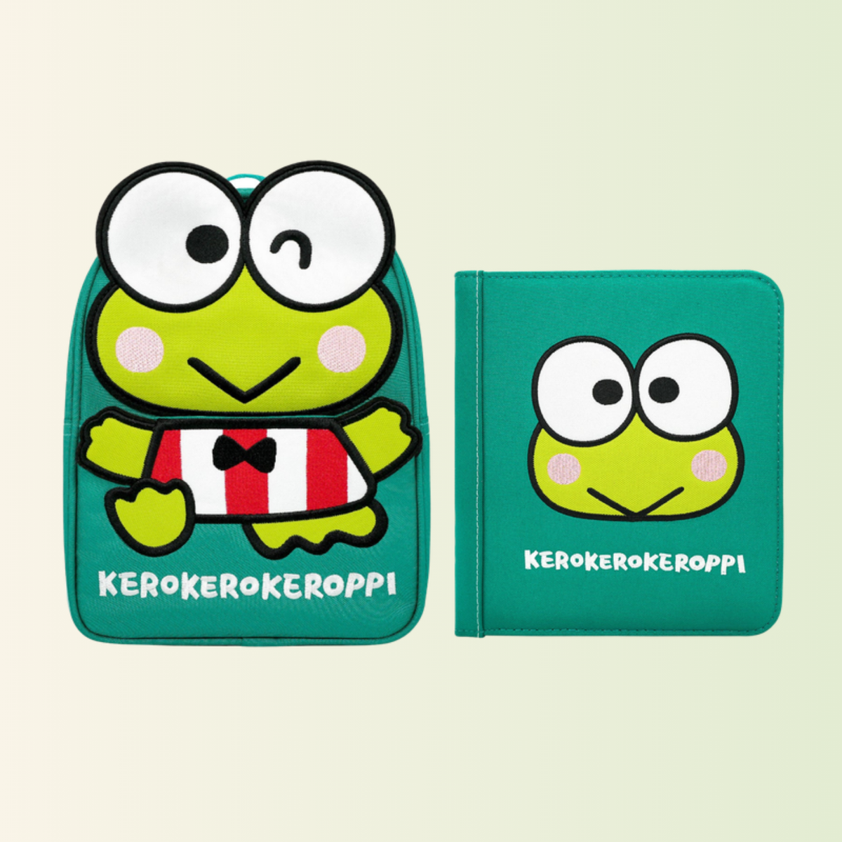 Quiet book My First Book Keroppi con mochila a juego, recortado sobre fondo suave de pradera