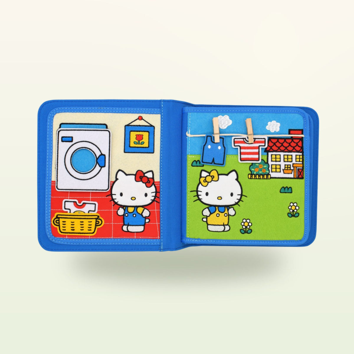 Doble página del lavado del quiet book Hello Kitty sobre fondo suave de color crema – a partir de 1 año